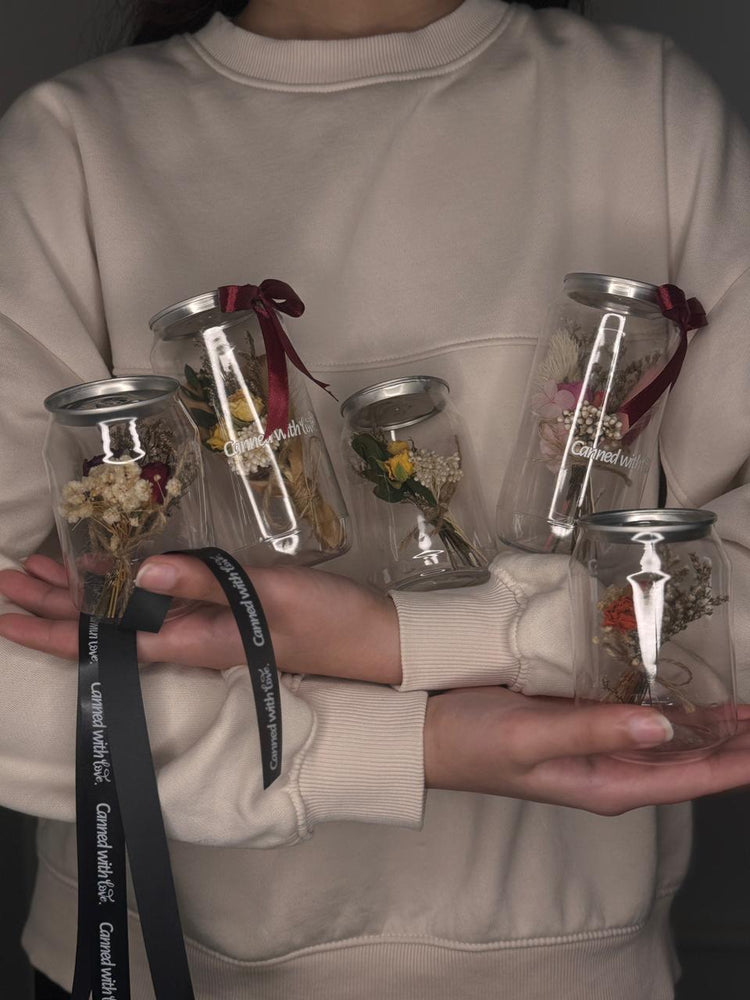 Preserved flowers in a can